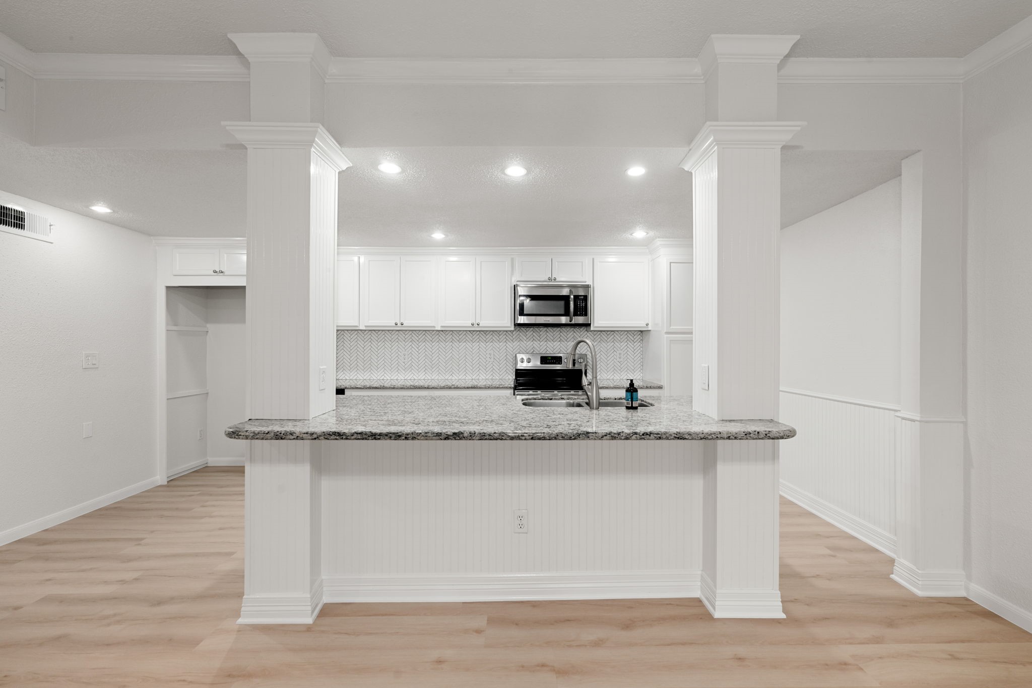 5711 Sugar Hill Drive, Unit 69 Houston, TX 77057 - Photo 7 of 16 a view of kitchen with stainless steel appliances granite countertop refrigerator stove microwave and oven