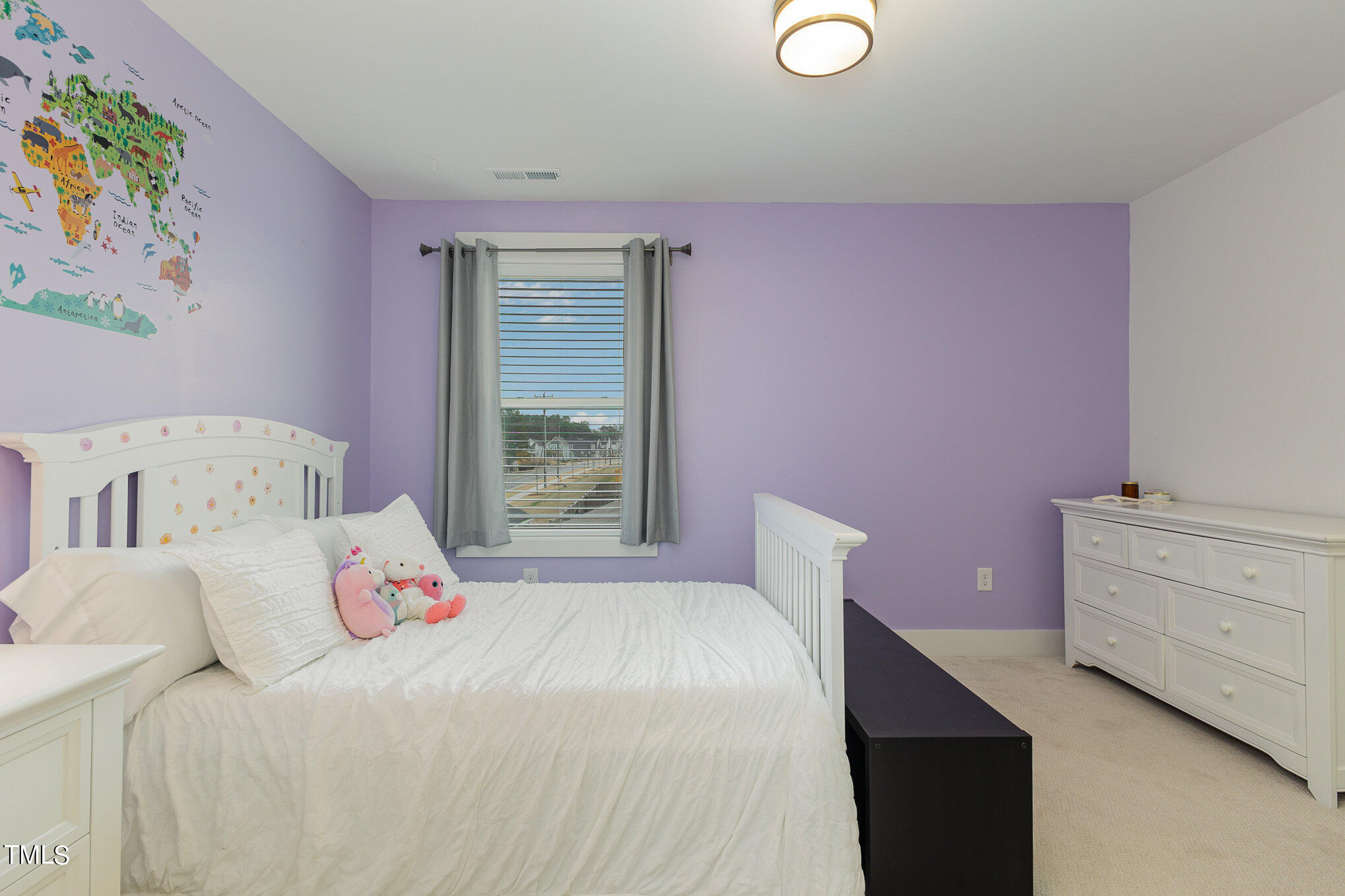 205 Daniel Ridge Road Wendell, NC 27591 - Photo 21 of 24 a bedroom with a bed and a window