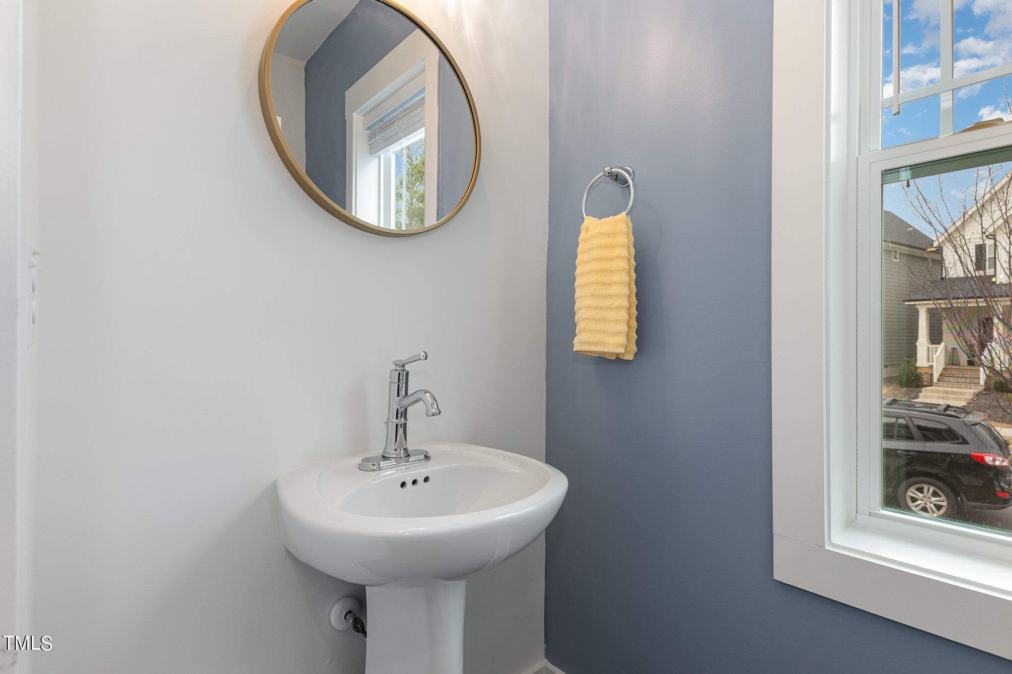 205 Daniel Ridge Road Wendell, NC 27591 - Photo 5 of 24 a bathroom with a sink and a mirror