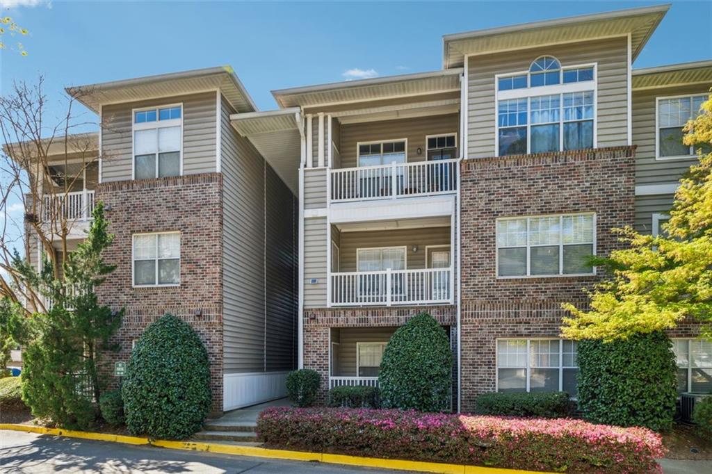 2700 Pine Tree Road Northeast, Unit 1115 Atlanta, GA 30324 - Photo 26 of 29 a front view of a house