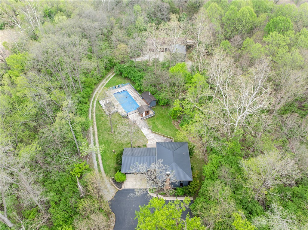 6750 Little Twin Road Germantown, OH 45327 - Photo 80 of 88 An aerial view showcases a residence nestled among lush trees, featuring a private pool and winding driveways.