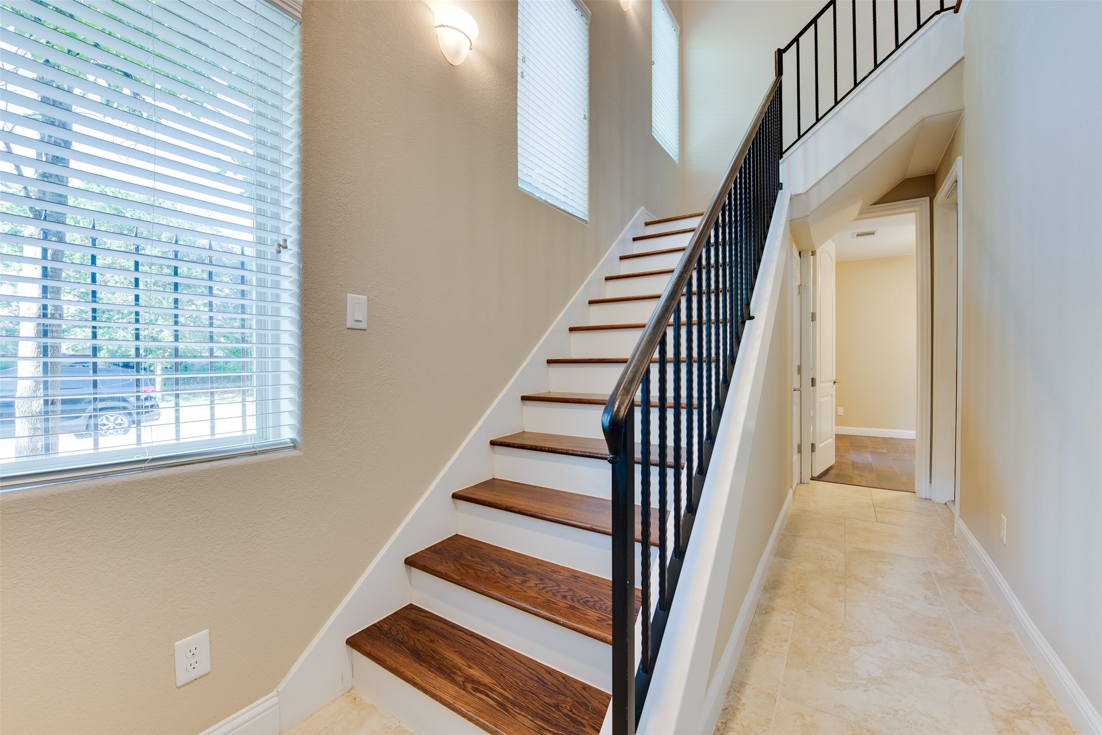 6105 Stillman Street Houston, TX 77007 - Photo 2 of 33 a view of entryway and hall with wooden floor