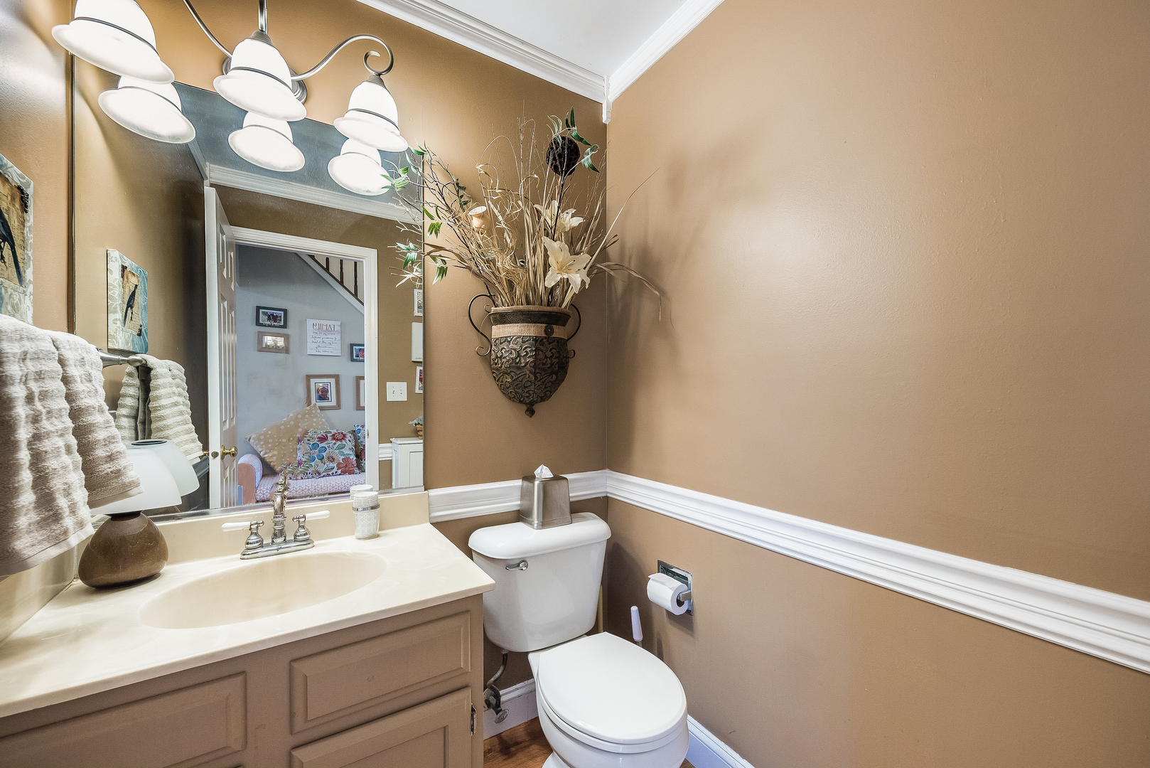 716 Pinehurst Lane Oswego, IL 60543 - Photo 14 of 25 a bathroom with a sink vanity mirror and toilet