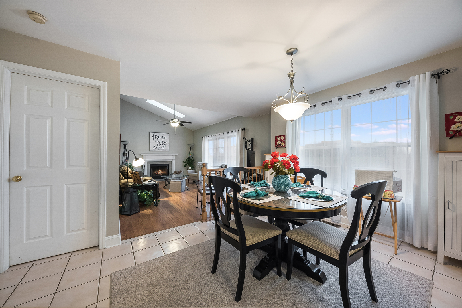 716 Pinehurst Lane Oswego, IL 60543 - Photo 10 of 25 a dining room with furniture and a chandelier
