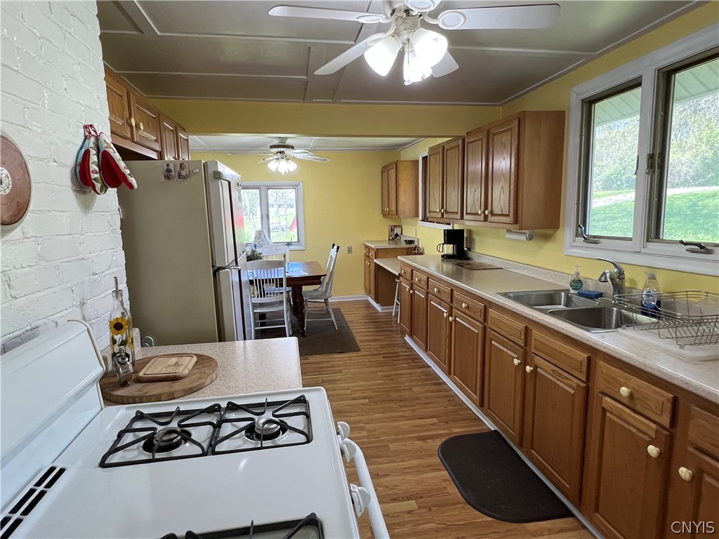 2055 Fitzgerald Point South Otisco, NY 13110 - Photo 11 of 22 Galley kitchen looking at the dining area