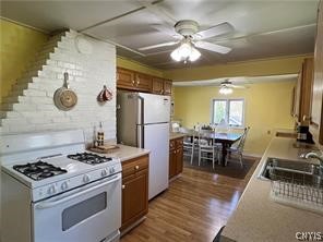 2055 Fitzgerald Point South Otisco, NY 13110 - Photo 10 of 22 view from kitchen to dining area