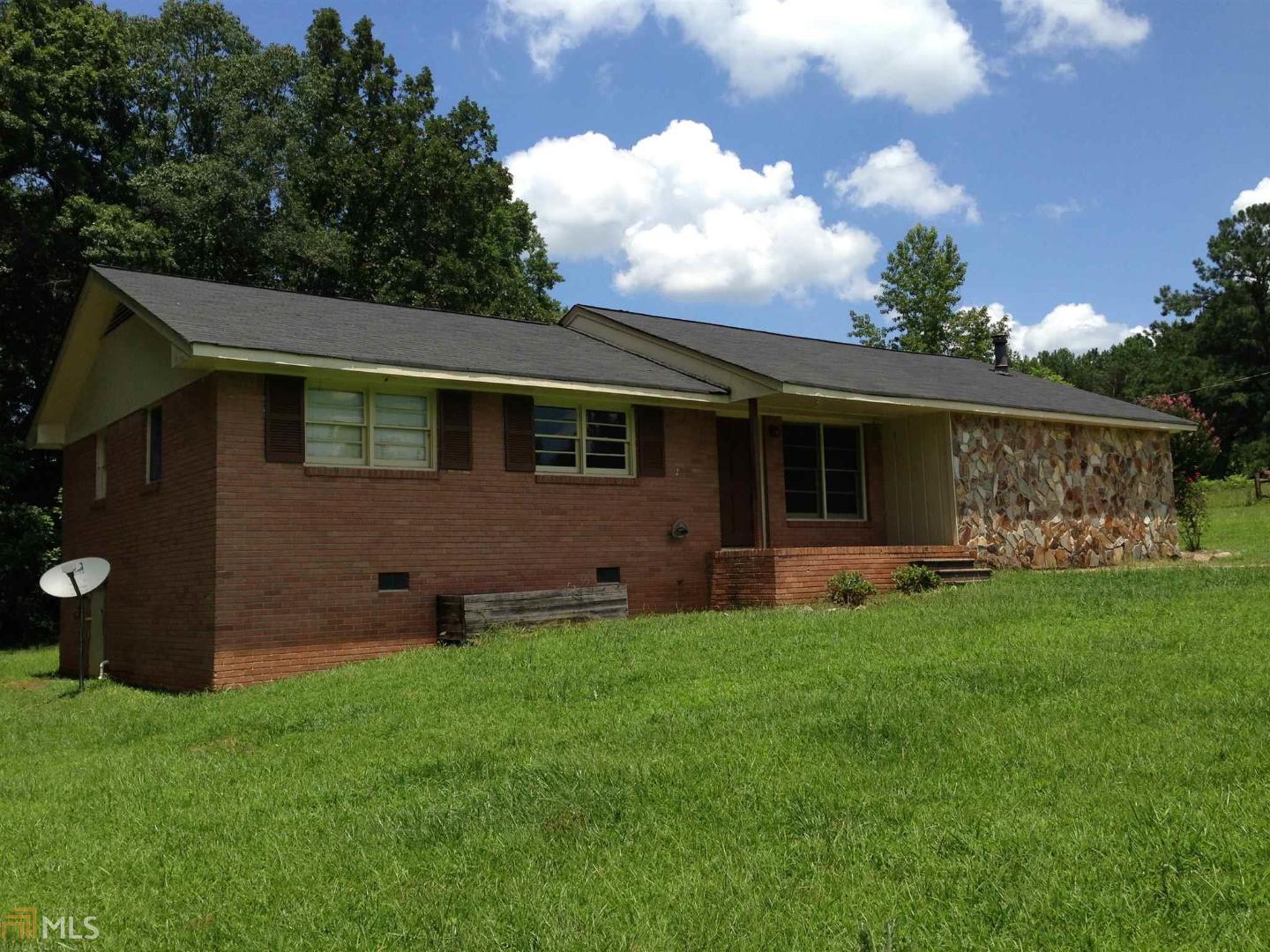 336 Flat Rock Road Villa Rica, GA 30180 - Photo 1 of 1 a view of house with backyard