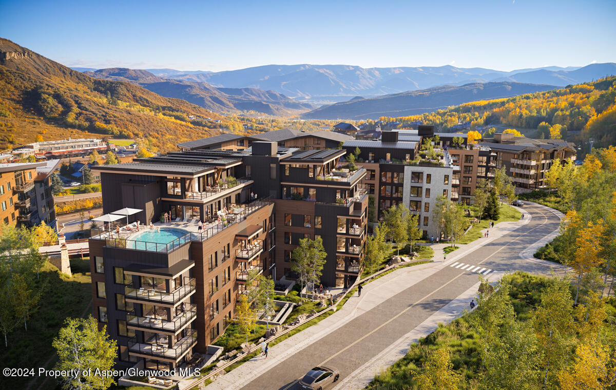 221 Wood Road, Unit 205 Snowmass Village, CO 81615 - Photo 5 of 7 an aerial view of residential houses and outdoor space