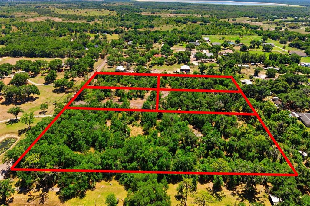 19084 Red Bird Lane, Unit LOT 1 Lithia, FL 33547 - Photo 9 of 21 an aerial view of residential house with outdoor space and seating