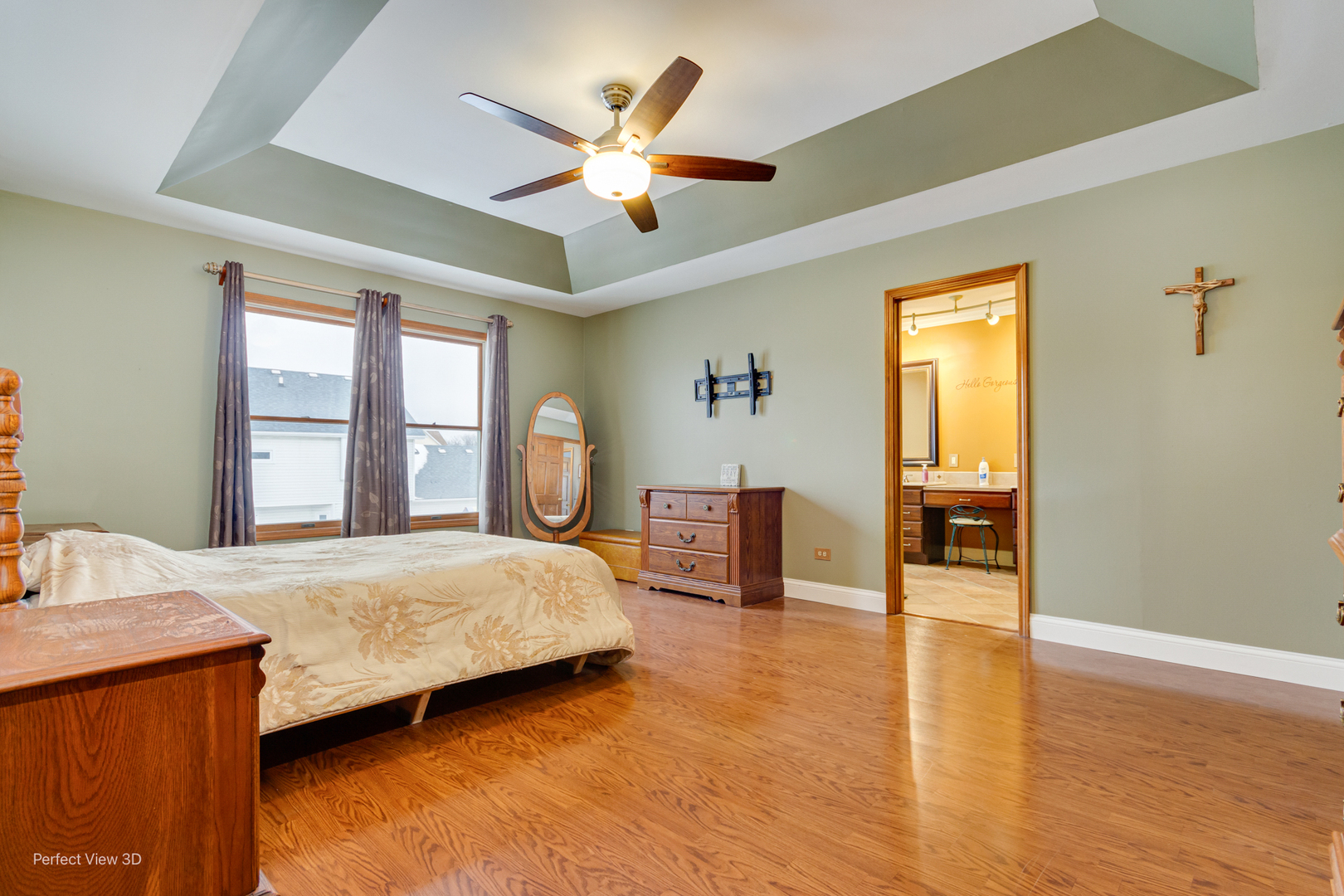 1910 Hampton Court Plainfield, IL 60586 - Photo 20 of 36 a bedroom with a bed and wooden floor