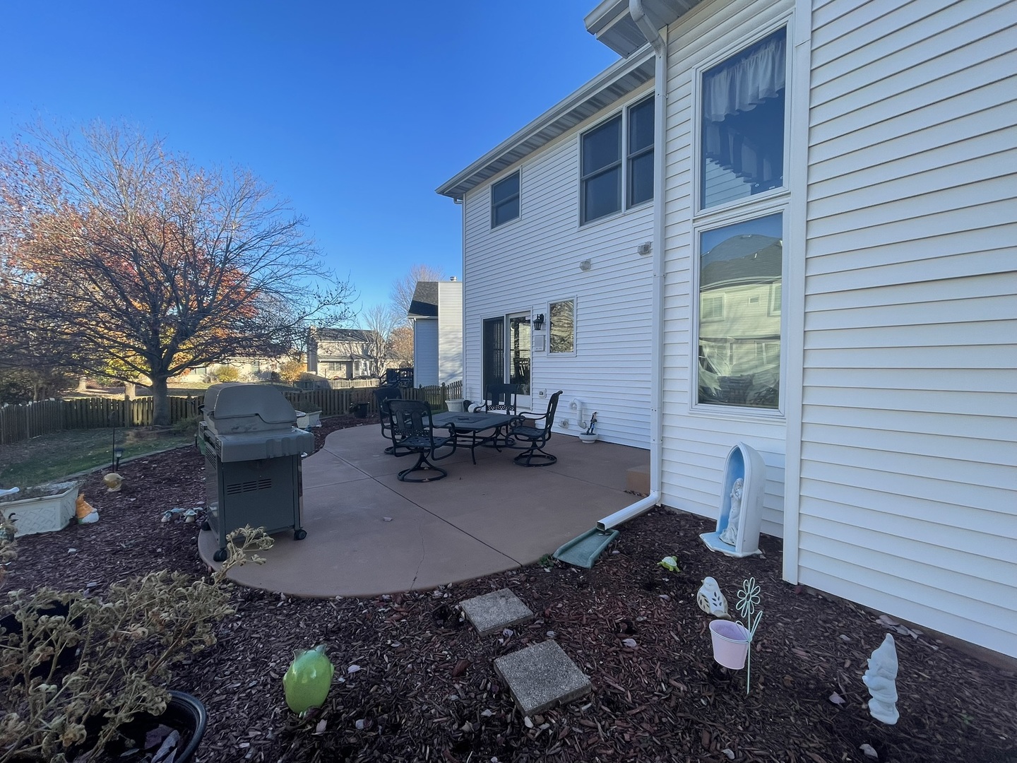 1910 Hampton Court Plainfield, IL 60586 - Photo 30 of 36 a view of a backyard with sitting area