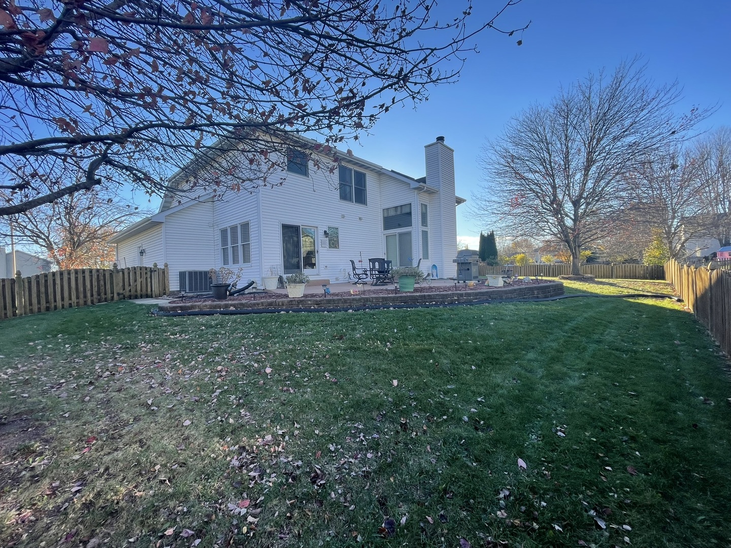 1910 Hampton Court Plainfield, IL 60586 - Photo 32 of 36 a front view of house with yard and seating area