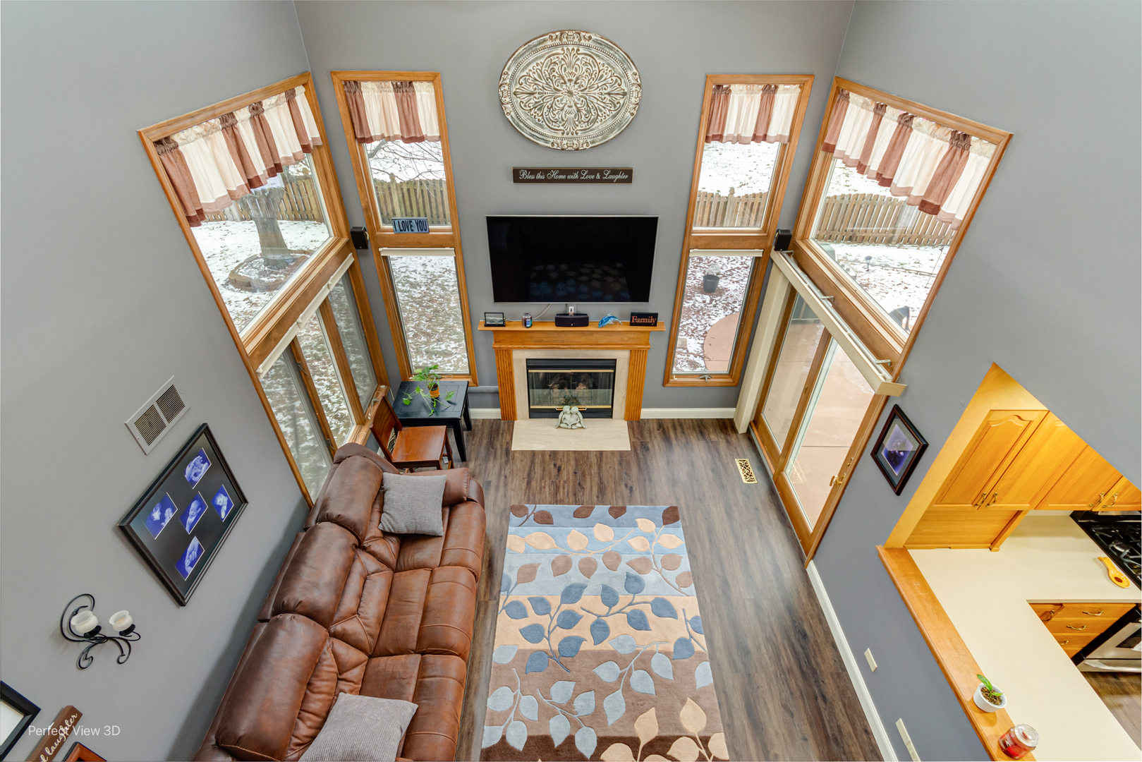 1910 Hampton Court Plainfield, IL 60586 - Photo 8 of 36 a living room with furniture and a fireplace