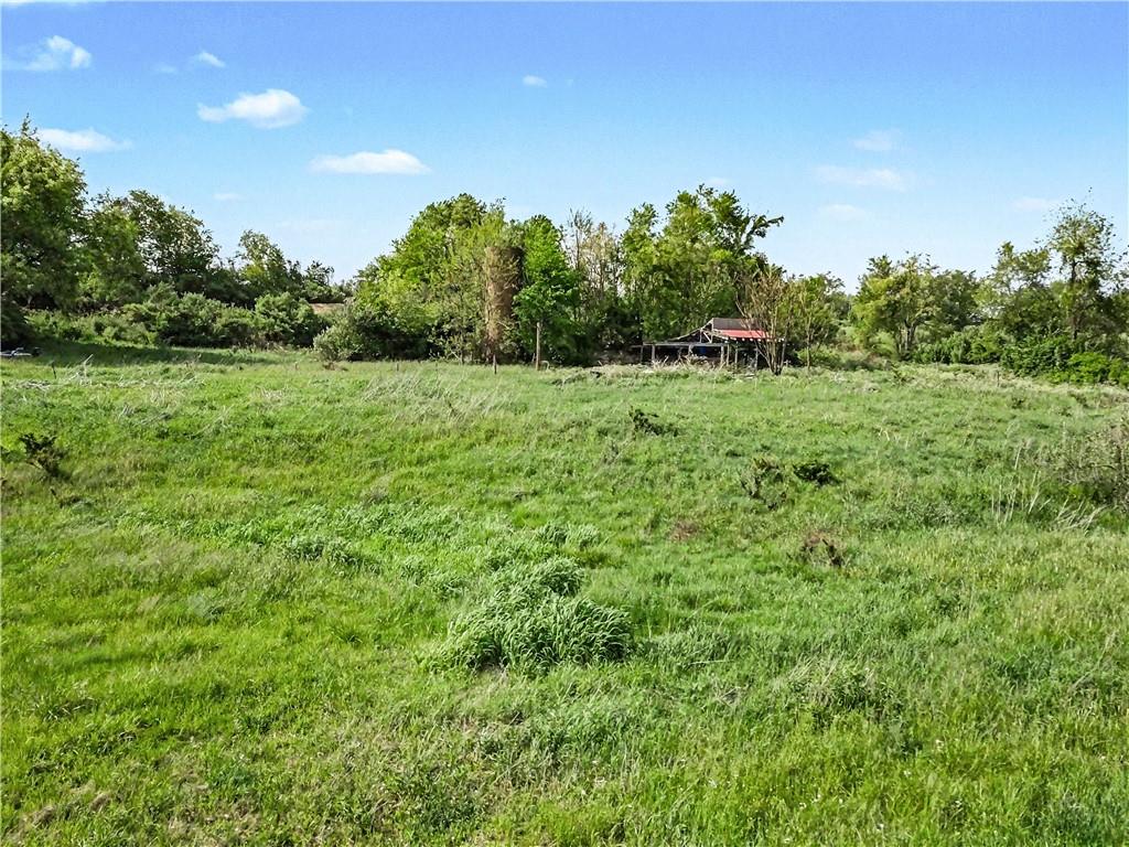 150 Iseman Road Freeport, PA 16229 - Photo 11 of 19 a view of a green field with trees in the background