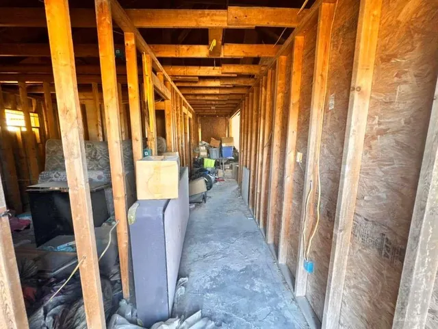 a view of entryway with furniture and a window