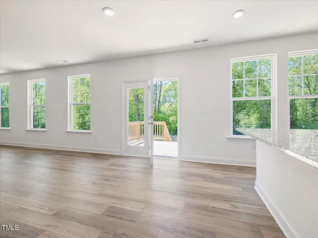 an empty room with windows