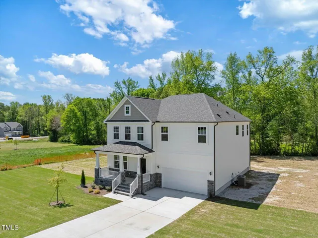 a hallway with wooden floor in living room