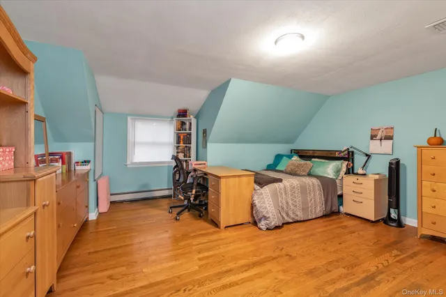 a view of a room with closet and windows