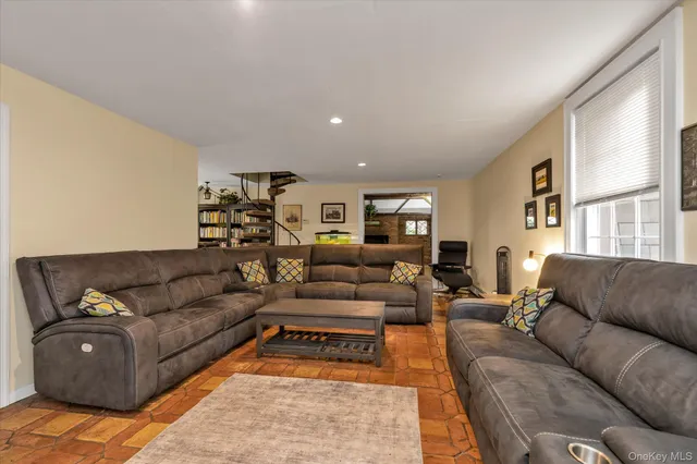 a living room with furniture and a couch