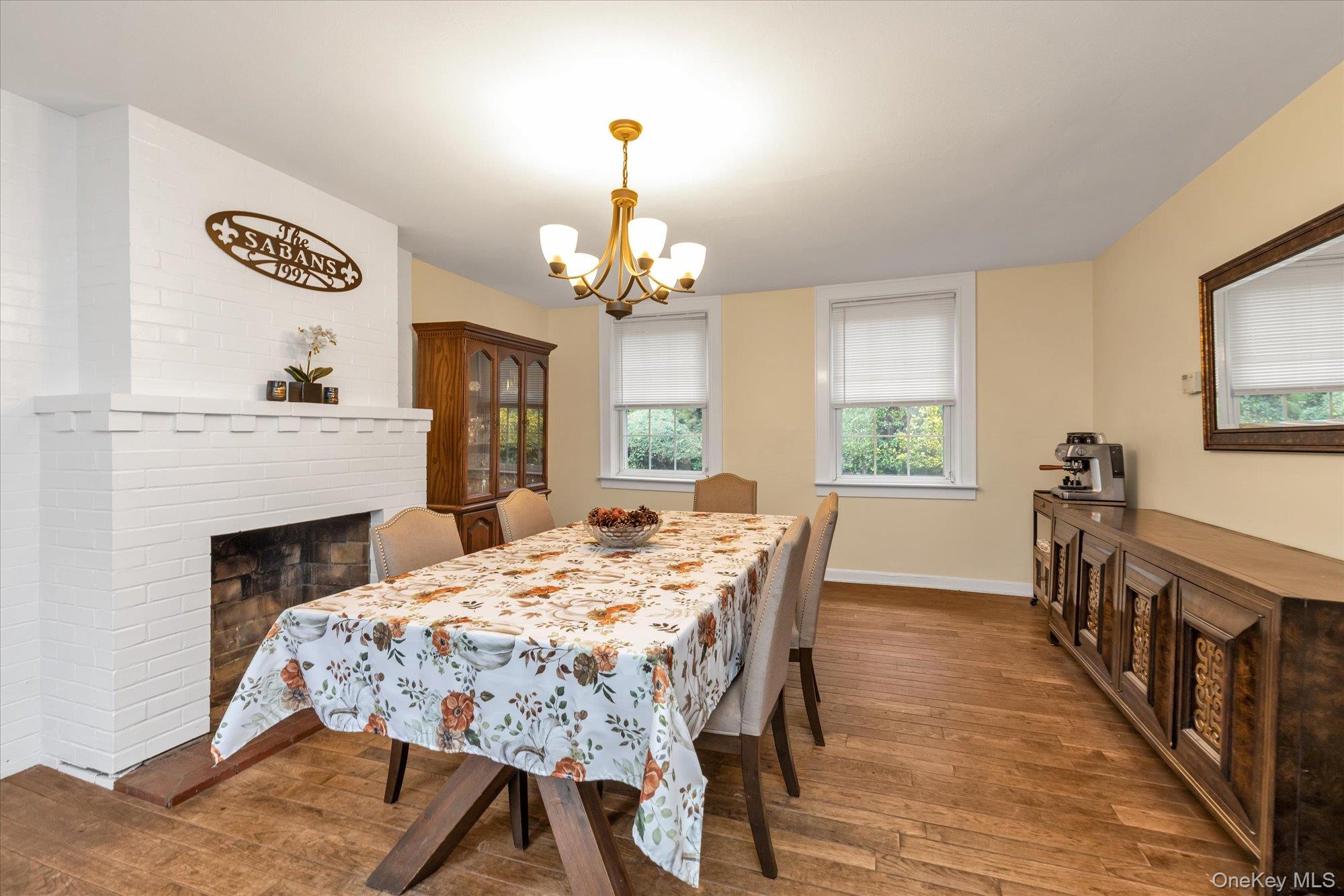 2177 Cedar Swamp Road Glen Head, NY 11545 - Photo 3 of 18 a view of a dining room with furniture window and wooden floor