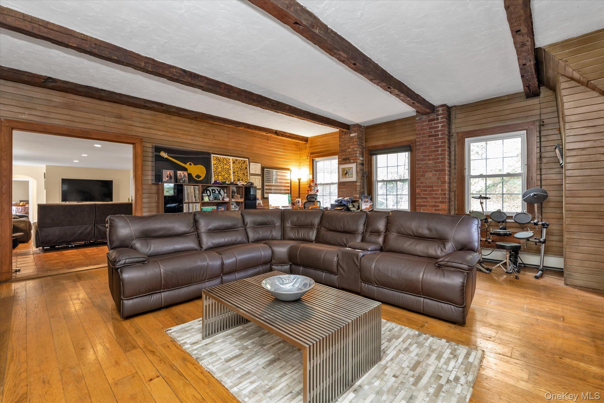 2177 Cedar Swamp Road Glen Head, NY 11545 - Photo 9 of 18 a living room with furniture and a large window