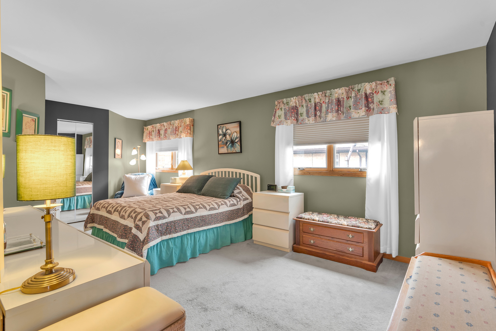 6528 Ridge Drive Chicago Ridge, IL 60415 - Photo 21 of 33 a bedroom with two beds and a dresser with mirror