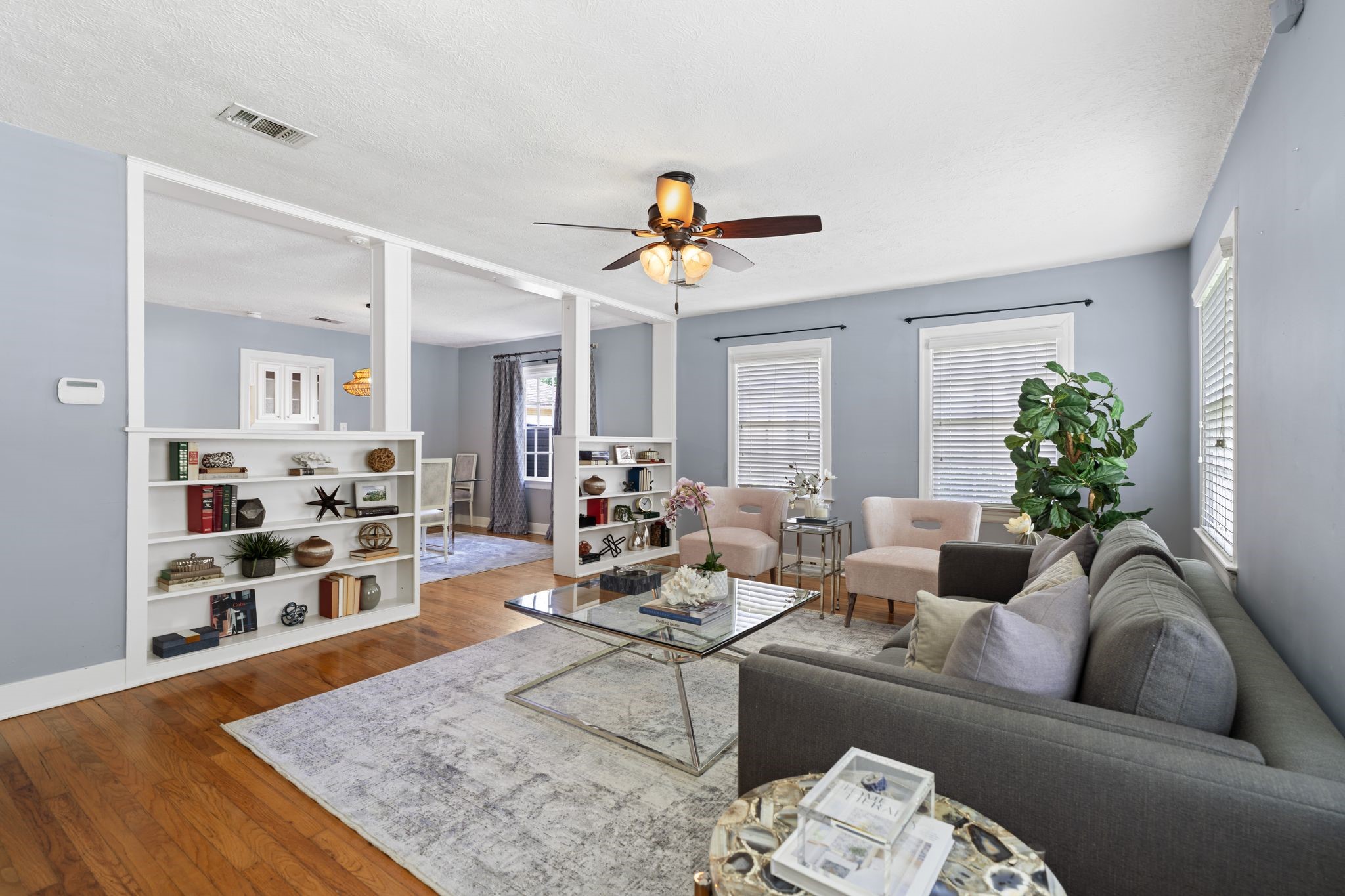 1102 Winston Street Houston, TX 77009 - Photo 13 of 30 a living room with furniture and a wooden floor