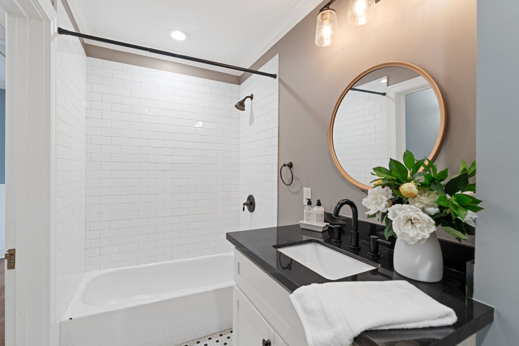 1102 Winston Street Houston, TX 77009 - Photo 21 of 30 a bathroom with a sink a toilet and a mirror