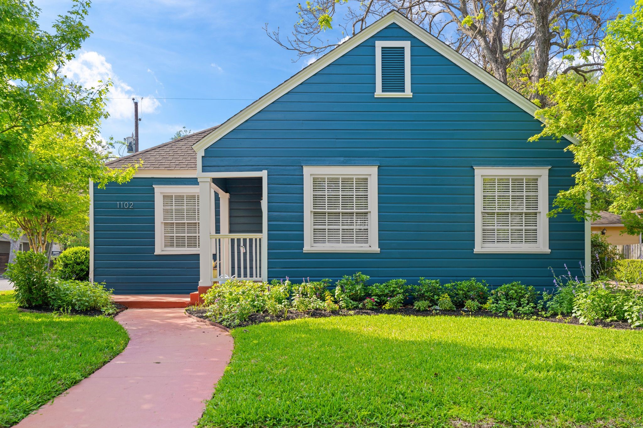 1102 Winston Street Houston, TX 77009 - Photo 30 of 30 a front view of a house with a yard