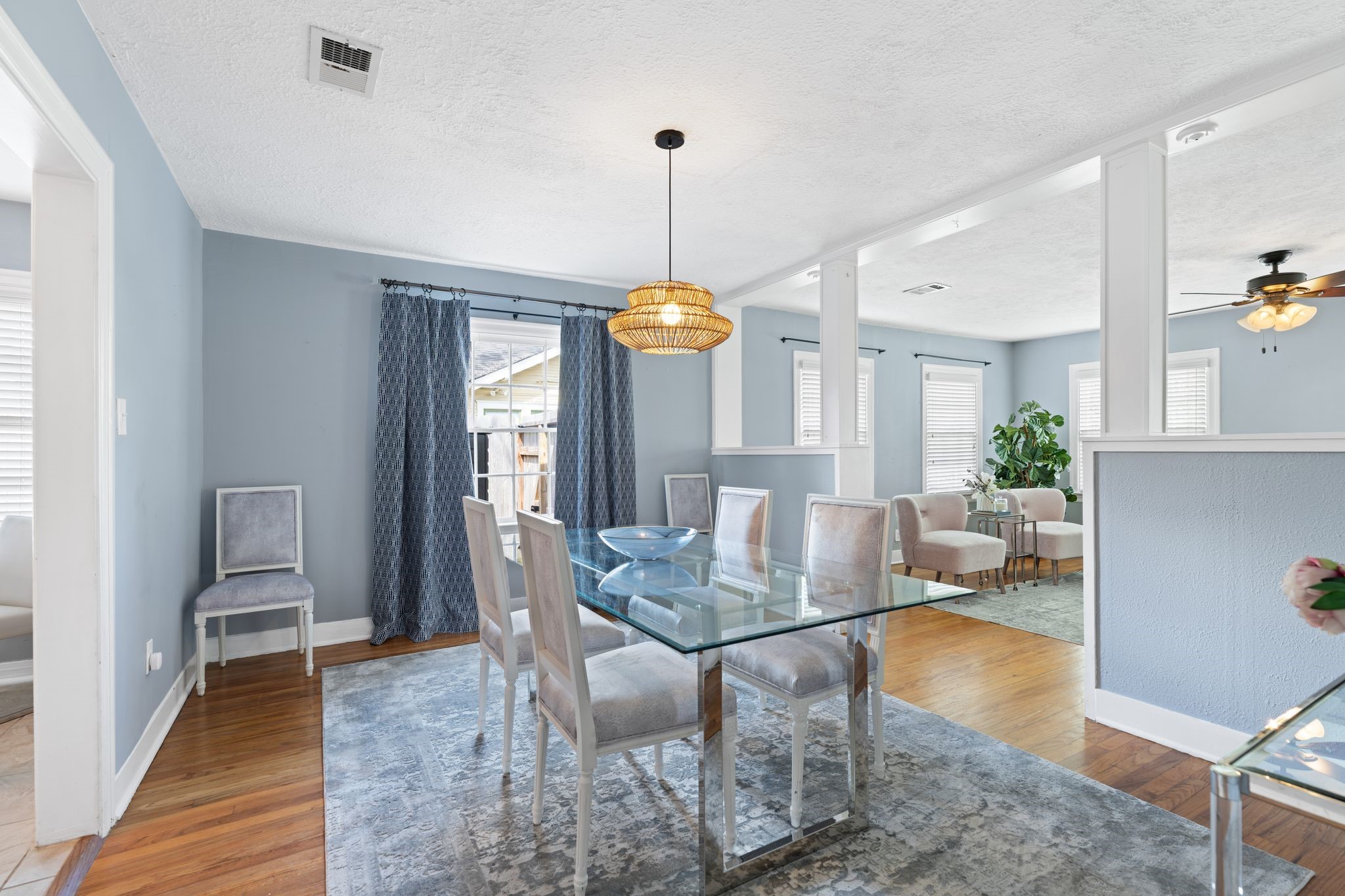 1102 Winston Street Houston, TX 77009 - Photo 3 of 30 a dining room with furniture window wooden floor