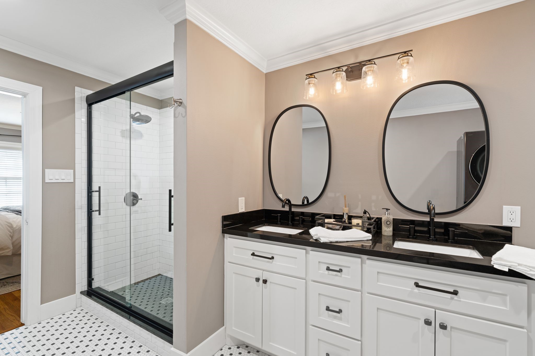 1102 Winston Street Houston, TX 77009 - Photo 6 of 30 a bathroom with a double vanity sink and a mirror