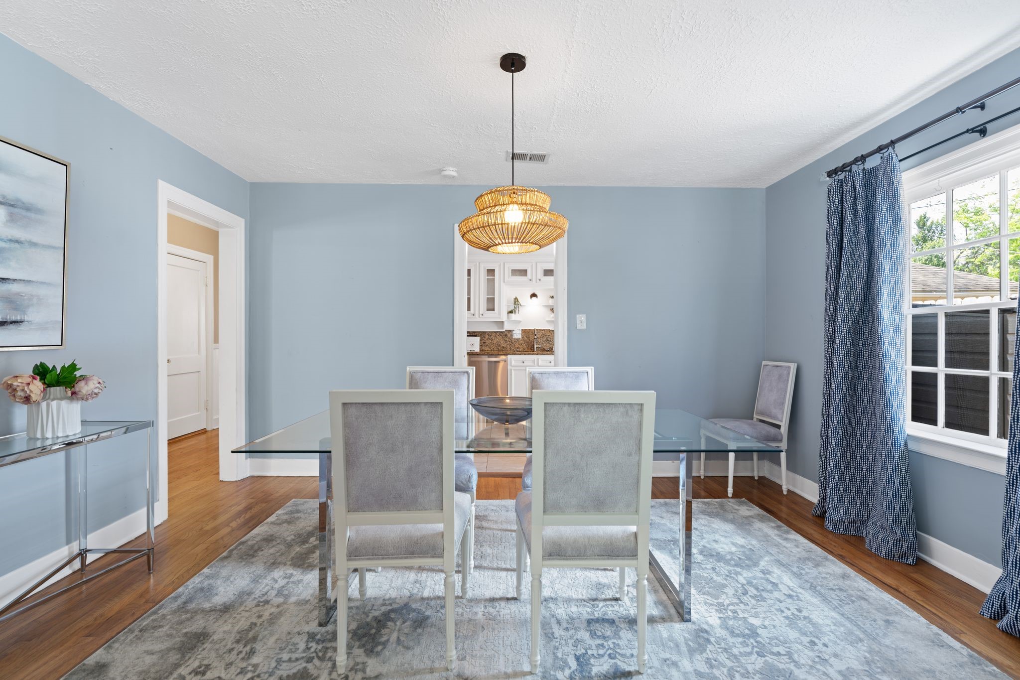 1102 Winston Street Houston, TX 77009 - Photo 8 of 30 a view of a dining room with furniture window and wooden floor