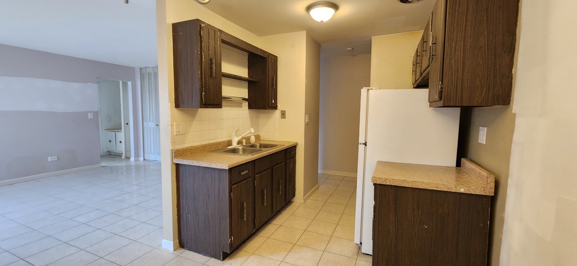 5100 North Sheridan Road, Unit 509 Chicago, IL 60640 - Photo 6 of 16 a bathroom with a sink and a mirror