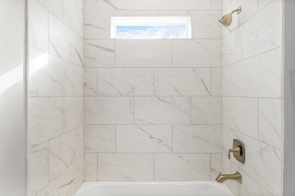 9 Fringetree Street Homosassa, FL 34446 - Photo 30 of 37 a bathroom with a bathtub