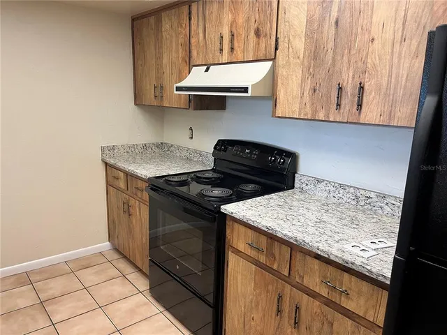 a kitchen with a sink and a cabinets