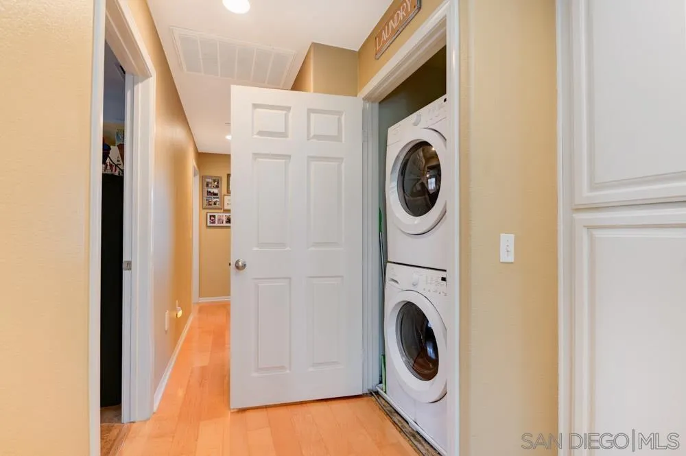 8713 Glen Oaks Way Santee, CA 92071 - Photo 13 of 22 a utility room with dryer and washer