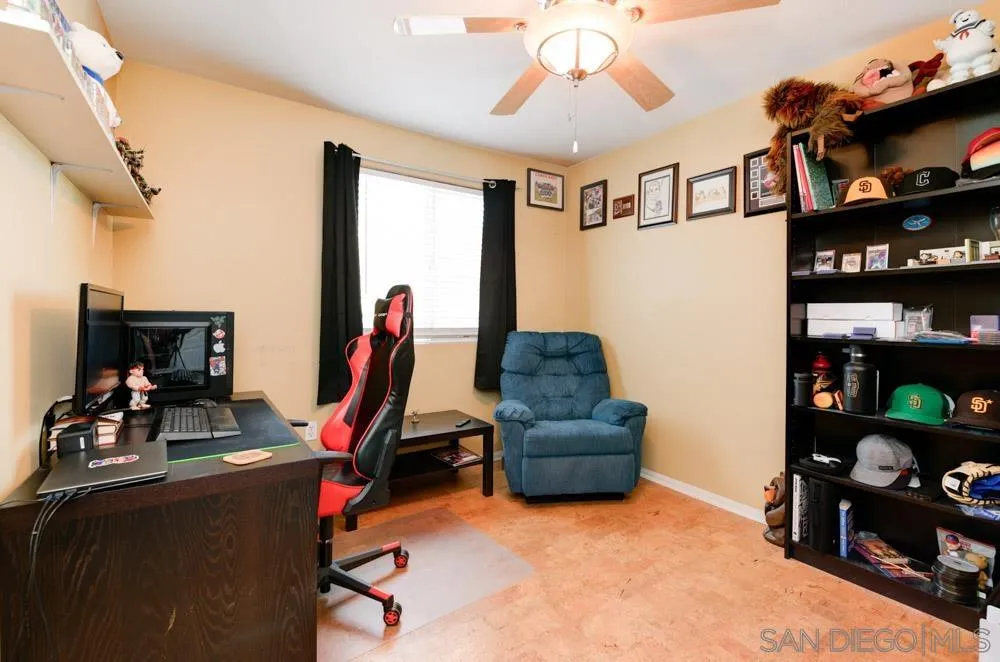 8713 Glen Oaks Way Santee, CA 92071 - Photo 17 of 22 a view of a room with workspace and toys