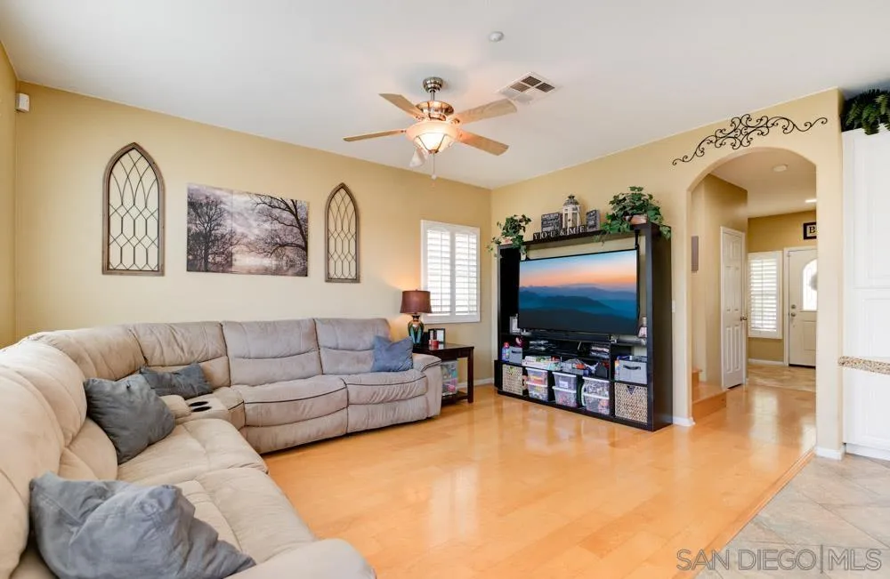 8713 Glen Oaks Way Santee, CA 92071 - Photo 7 of 22 a living room with furniture and a flat screen tv