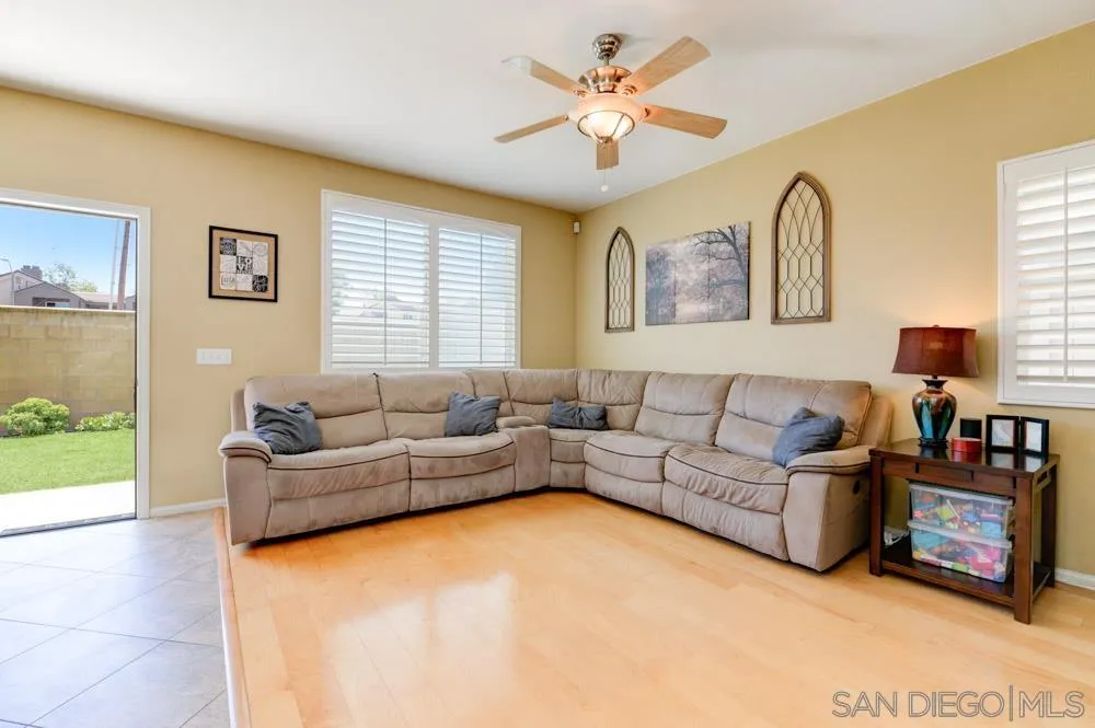 8713 Glen Oaks Way Santee, CA 92071 - Photo 8 of 22 a living room with furniture and a window