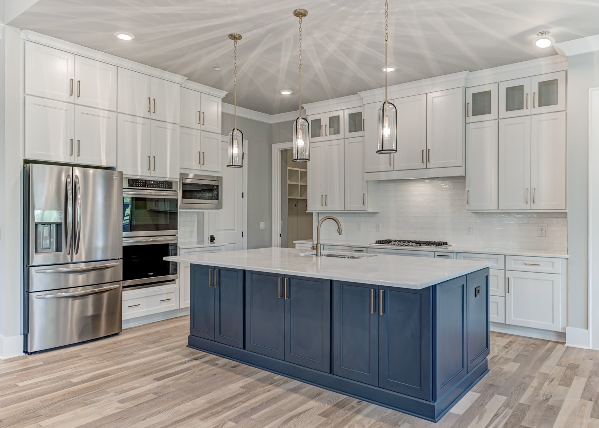 237 Circuit Road Franklin, TN 37064 - Photo 13 of 47 a kitchen with kitchen island granite countertop a sink stainless steel appliances and cabinets
