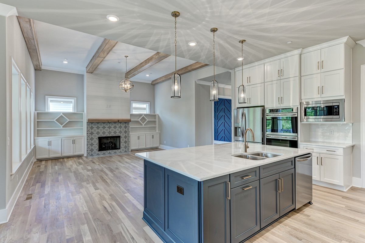 237 Circuit Road Franklin, TN 37064 - Photo 15 of 47 a kitchen with a sink chandelier and appliances