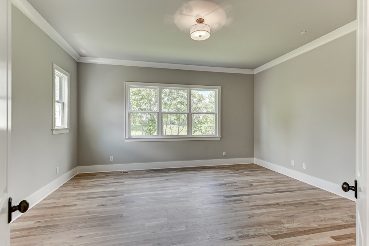 237 Circuit Road Franklin, TN 37064 - Photo 20 of 47 an empty room with wooden floor and windows