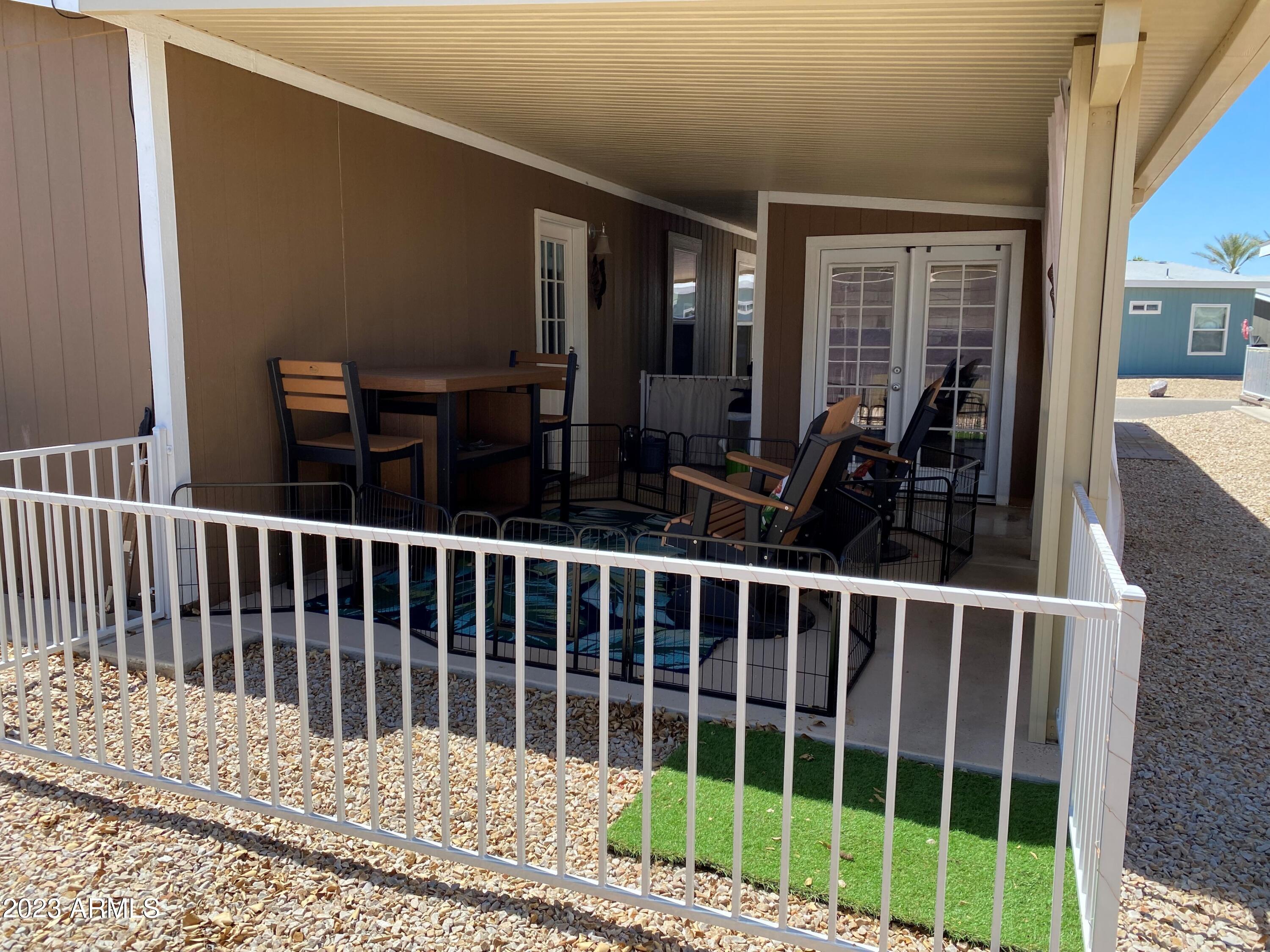 8865 East Baseline Road, Unit 132 Mesa, AZ 85209 - Photo 16 of 26 Back Patio and Shed