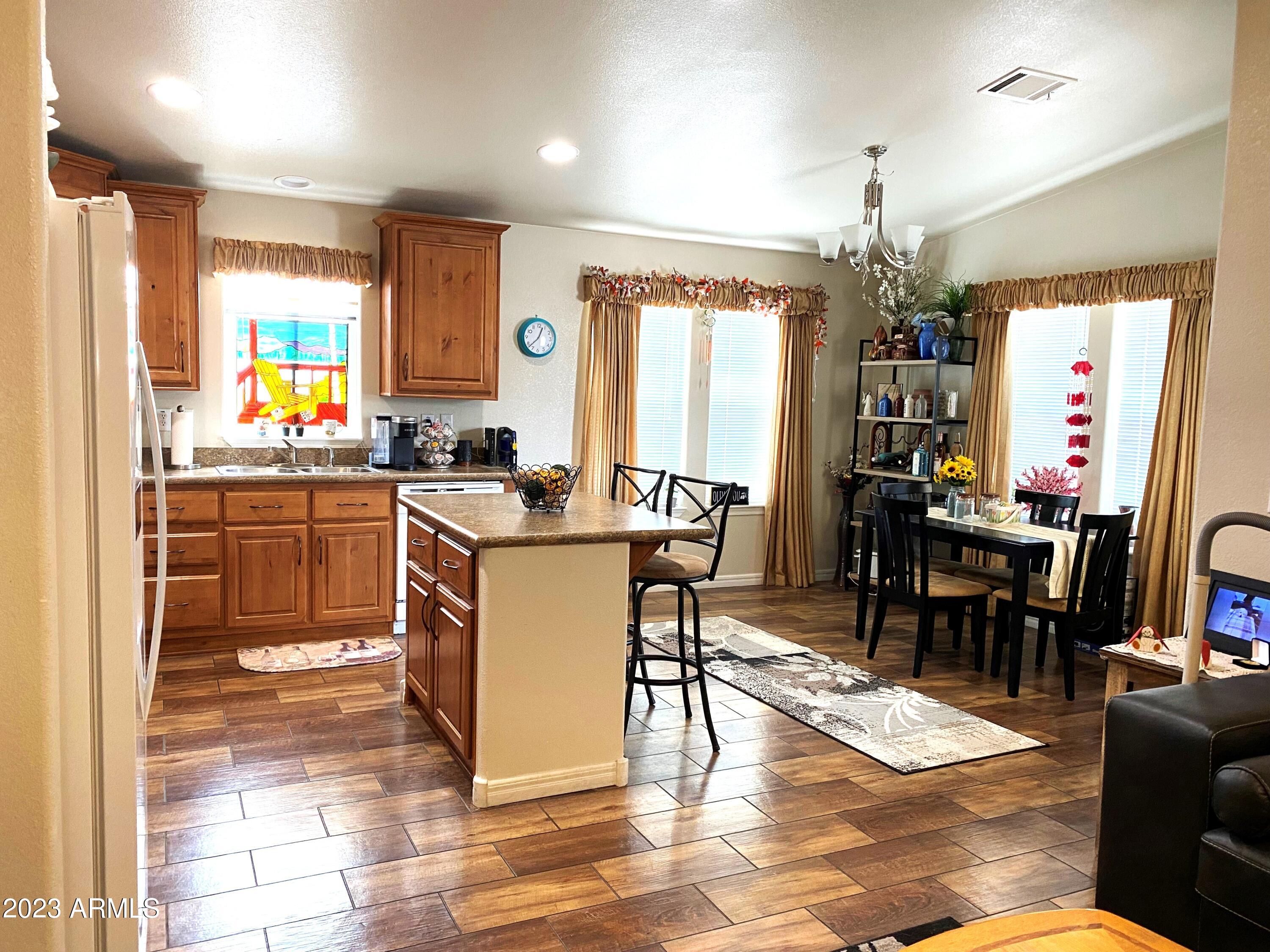 8865 East Baseline Road, Unit 132 Mesa, AZ 85209 - Photo 3 of 26 Kitchen and Dining Room