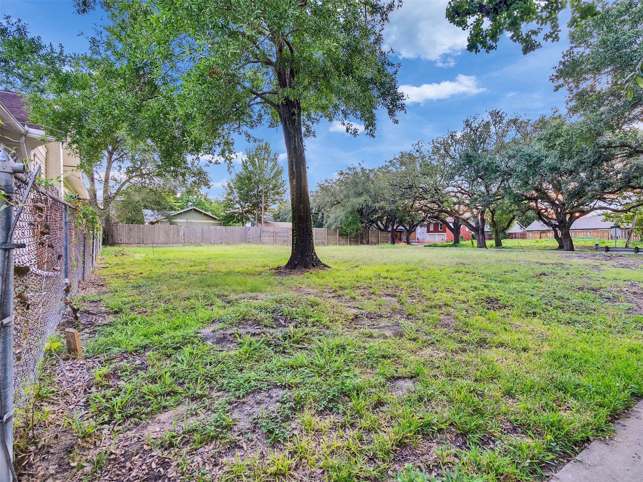 4404 Rusk Street Houston, TX 77023 - Photo 4 of 6 a view of green field with trees in the background