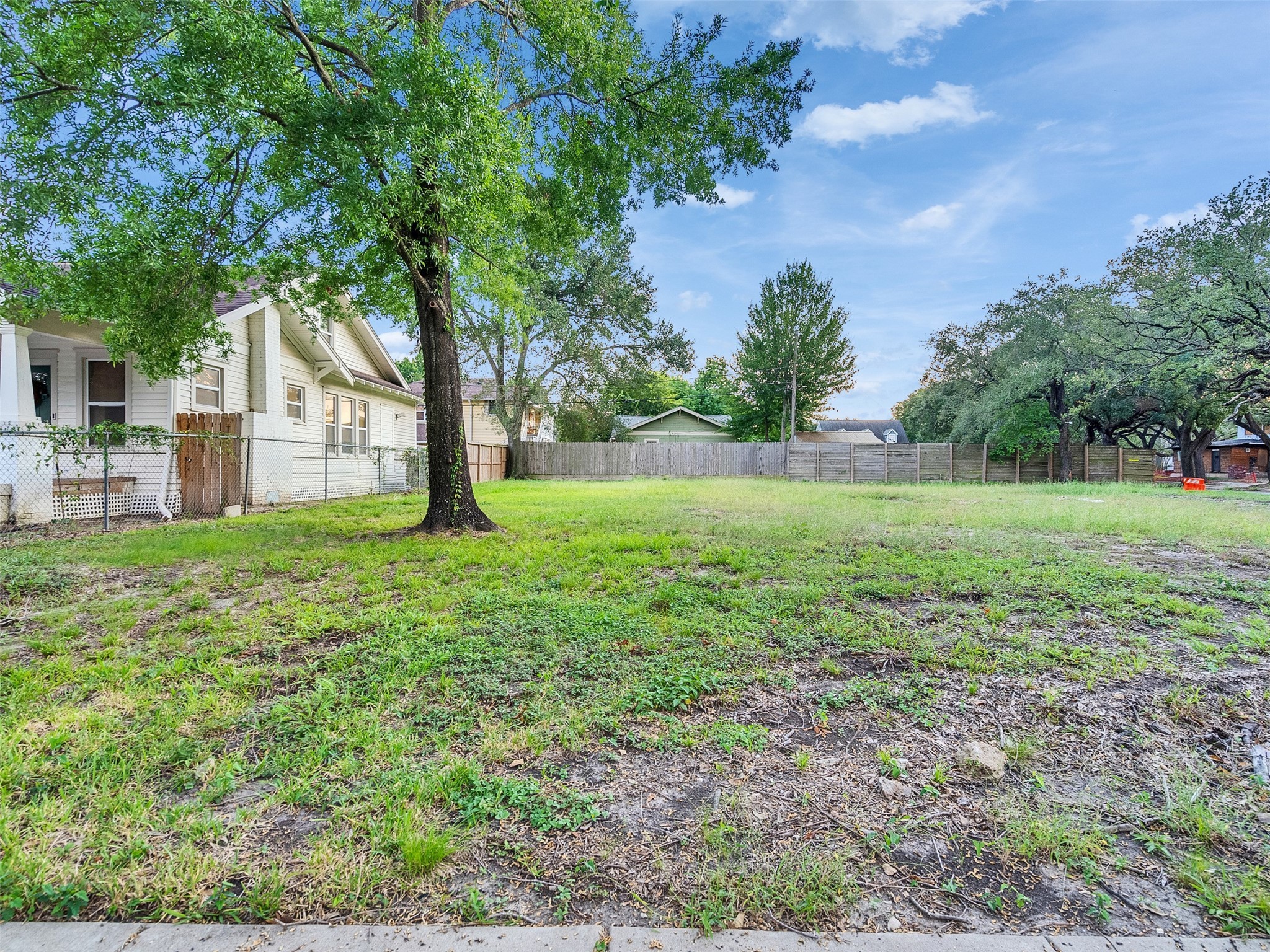 4404 Rusk Street Houston, TX 77023 - Photo 5 of 6 a view of a yard with a house in the background