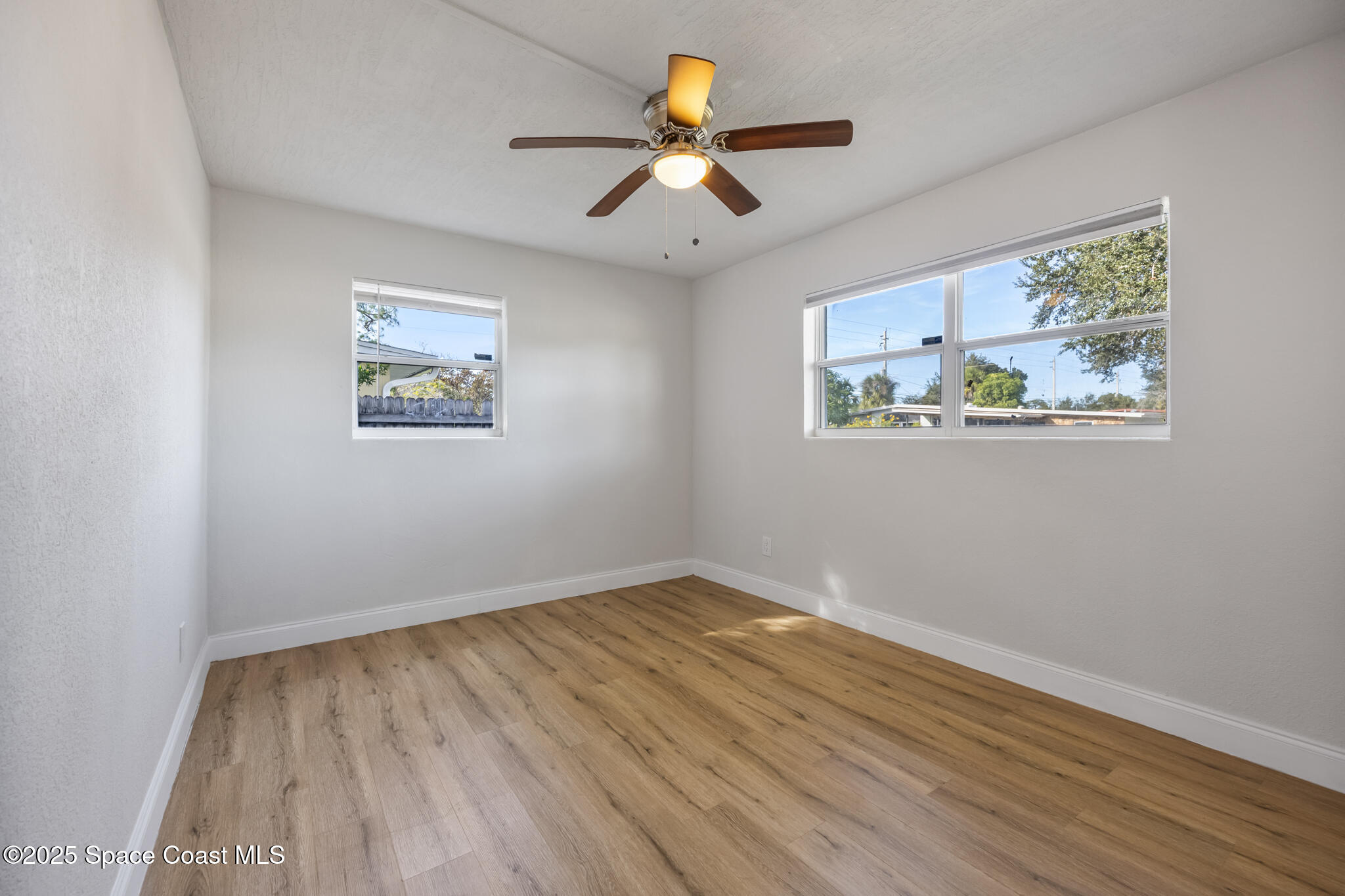 1107 Alamanda Lane Cocoa, FL 32922 - Photo 15 of 24 a view of empty room with wooden floor