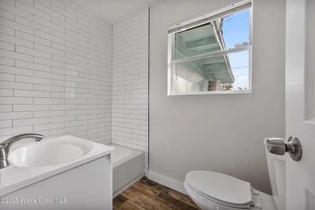 a bathroom with a sink and a toilet