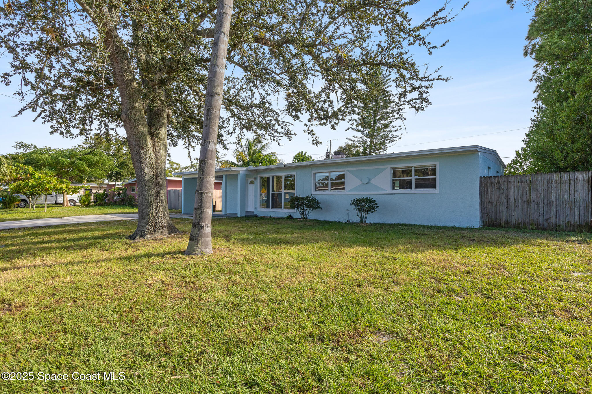 1107 Alamanda Lane Cocoa, FL 32922 - Photo 2 of 24 a view of a house with a swimming pool