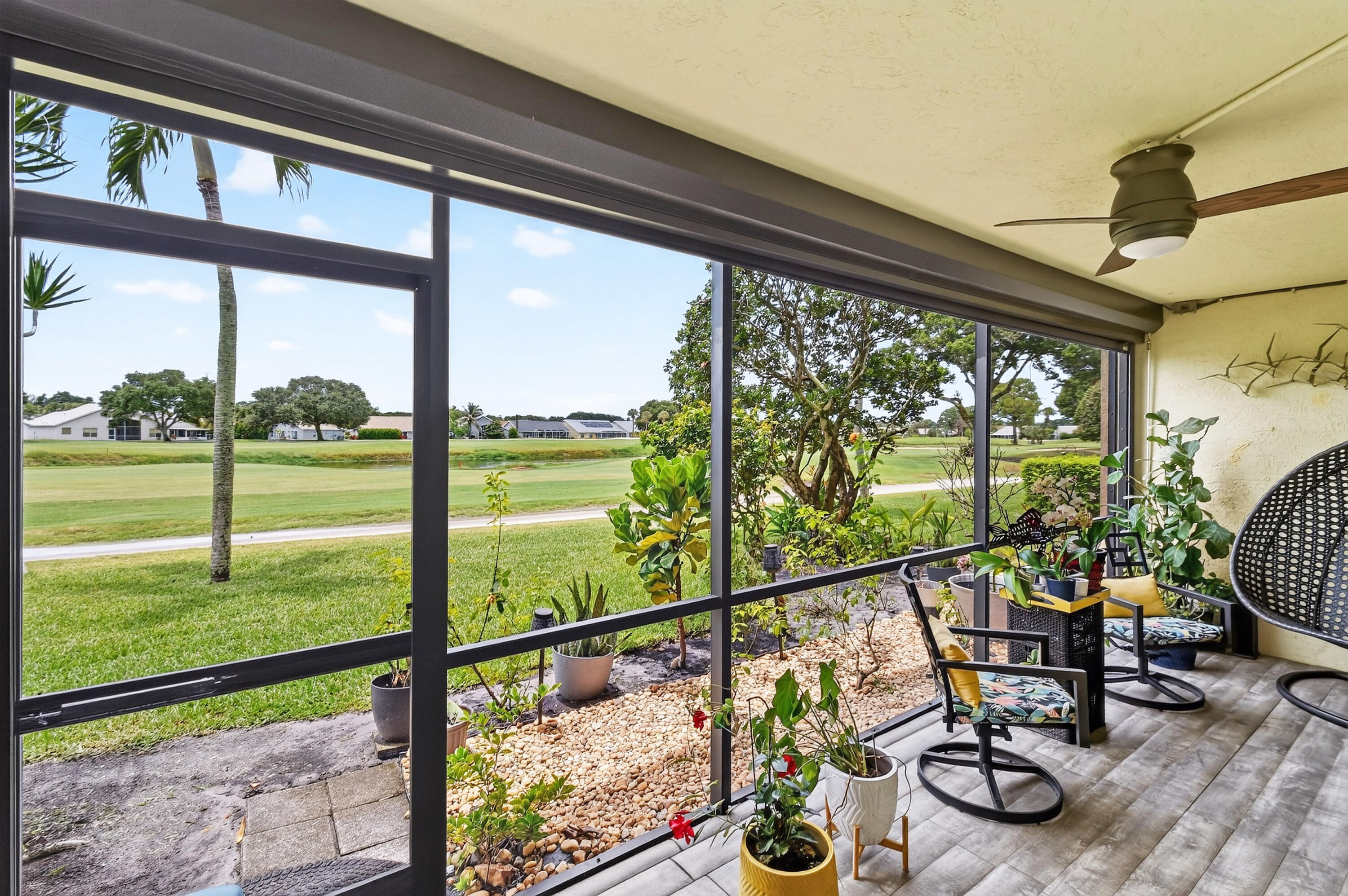 1091 Keystone Drive Jupiter, FL 33458 - Photo 33 of 57 Covered Screened Patio